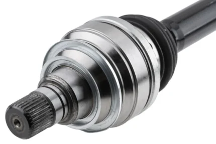 Detailed view of spline ends on BMW rear left driveshaft showing wheel and differential interfaces