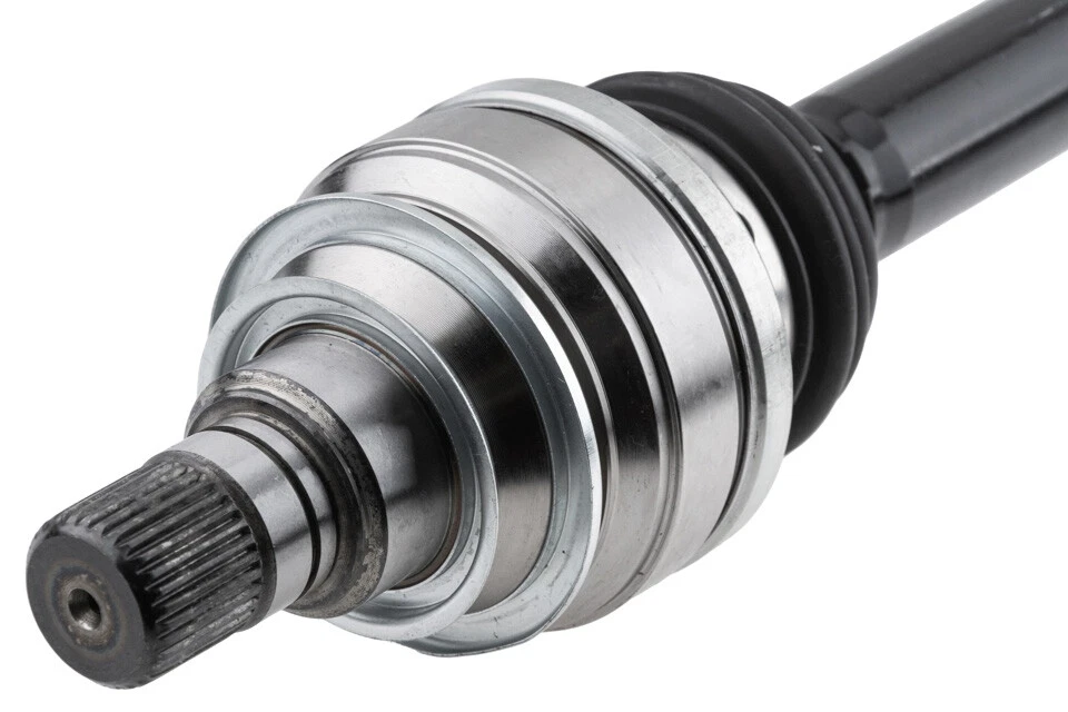 Detailed view of spline ends on BMW rear left driveshaft showing wheel and differential interfaces